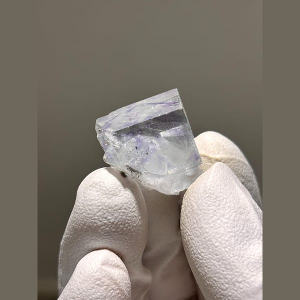 Glassy pale lilac fluorite cube from Zhejiang — detail view