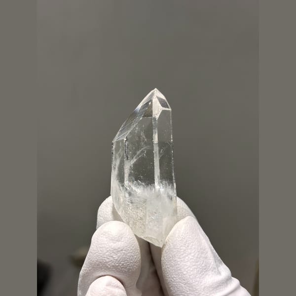 Clear quartz point with frosty base from Xuebaoding — detail view