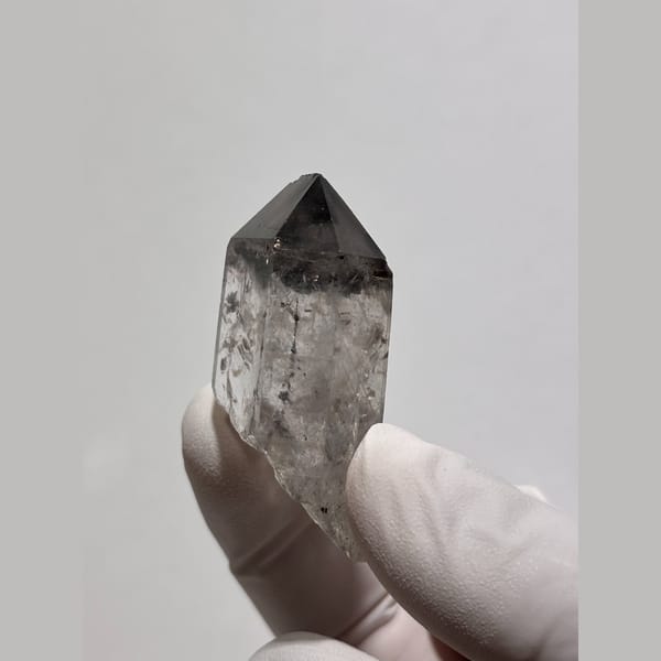 Quartz point with dark phantom tip from Jinkouhe — alternate view