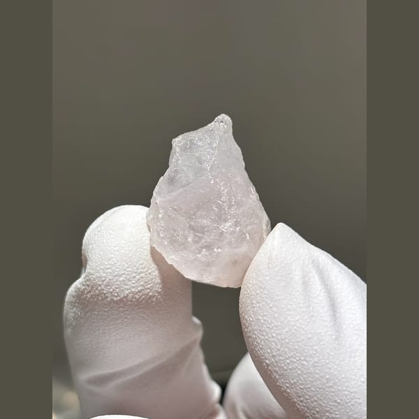 Small pale pink apatite crystal from Xuebaoding — complete view
