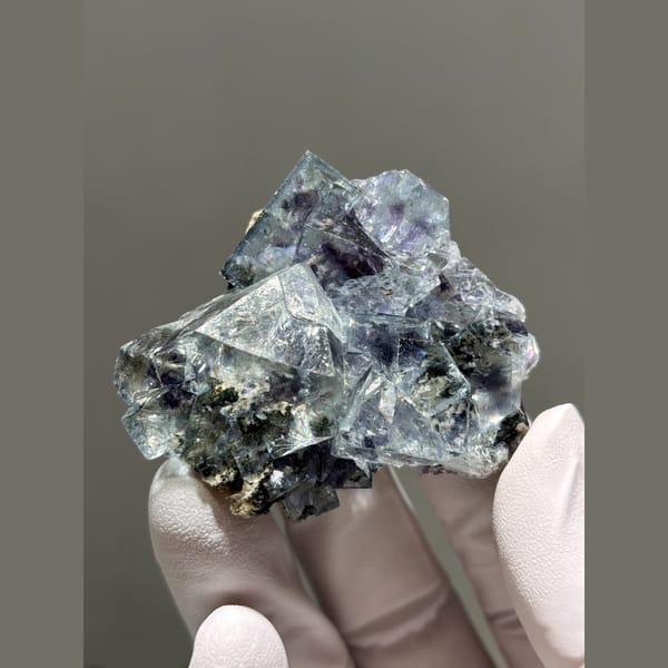 Blue-violet fluorite cubes with pyrite from Yaogangxian — complete view