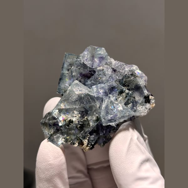 Blue-violet fluorite cubes with pyrite from Yaogangxian — alternate view