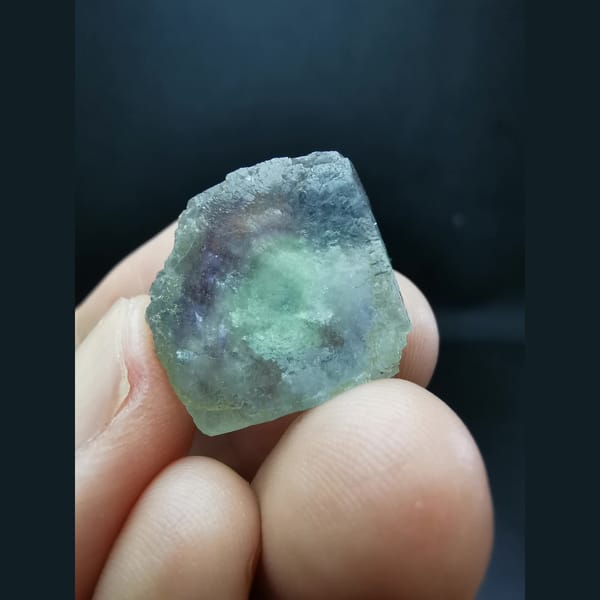 Blue fluorite crystal with purple inner frame — complete view