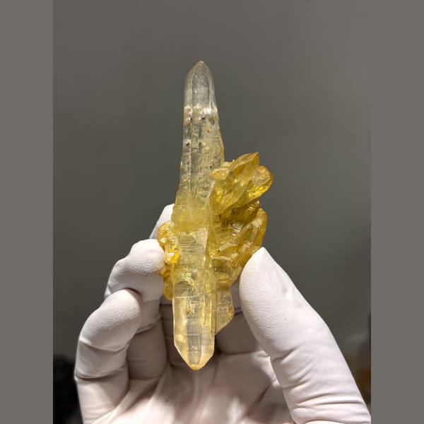 Long quartz point with golden yellow coated crystals from Pakistan — alternate view