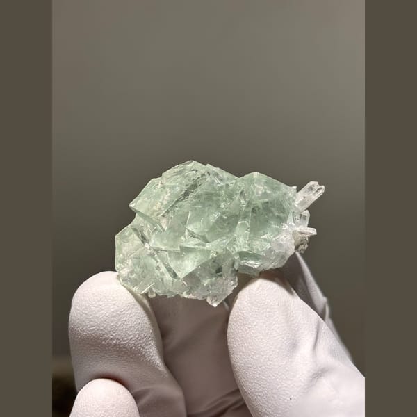 Pale green tabular fluorite with quartz from Zhejiang — alternate view