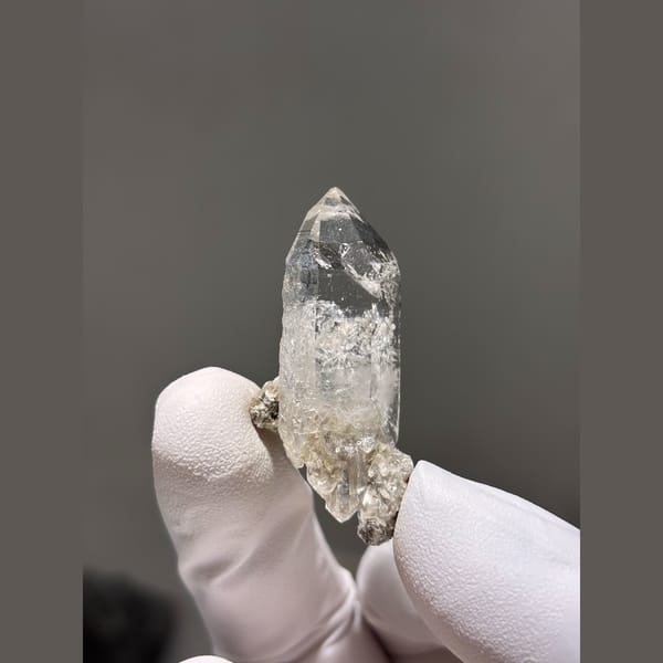 Complete double terminated clear quartz from Xuebaoding — complete view