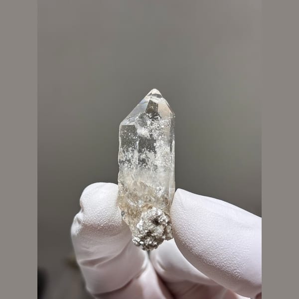 Complete double terminated clear quartz from Xuebaoding — alternate view