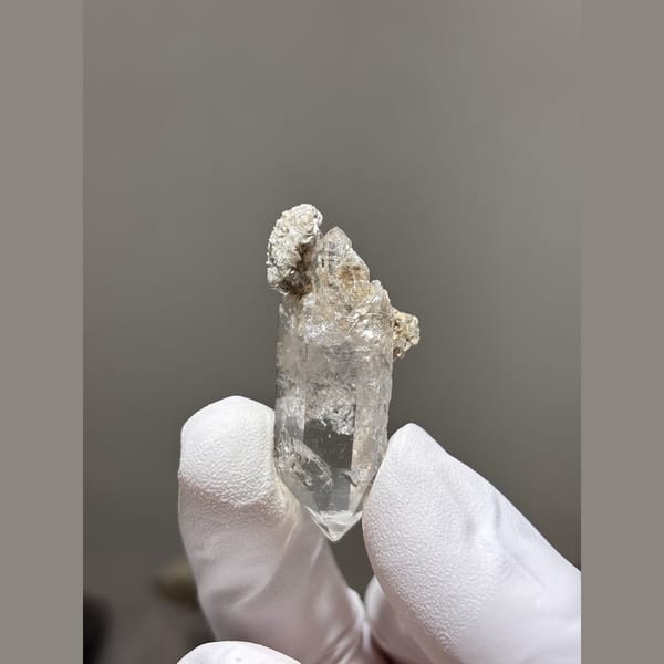 Complete double terminated clear quartz from Xuebaoding — alternate view