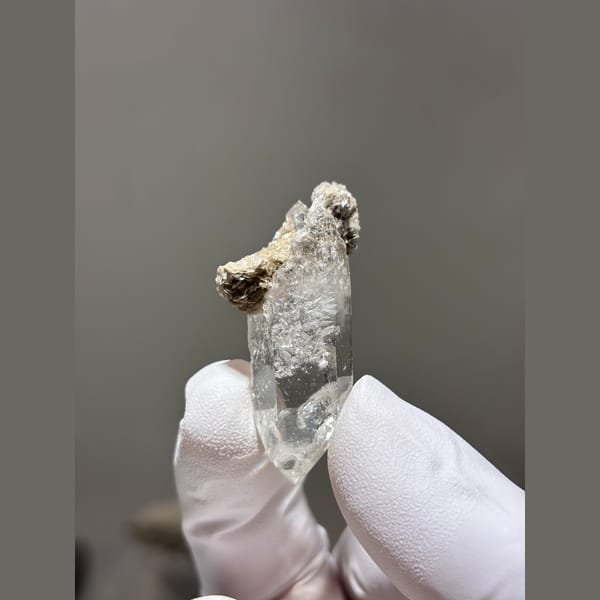 Complete double terminated clear quartz from Xuebaoding — detail view