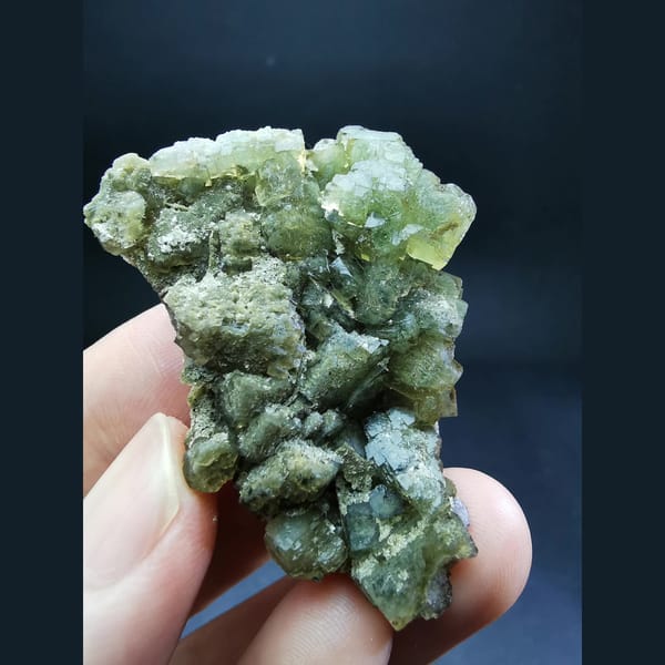 Yellow-green fluorite on calcite plates — complete view