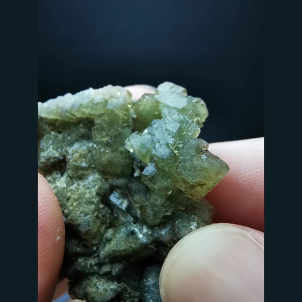 Yellow-green fluorite on calcite plates — alternate view