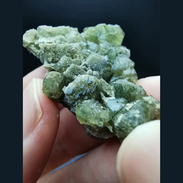 Yellow-green fluorite on calcite plates — alternate view