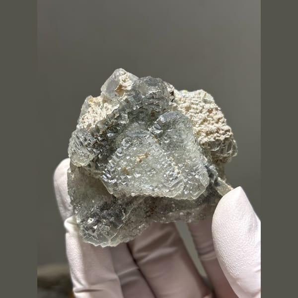 Grey-green fluorite with stepped terraced faces from Hunan — alternate view