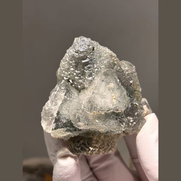 Grey-green fluorite with stepped terraced faces from Hunan — alternate view