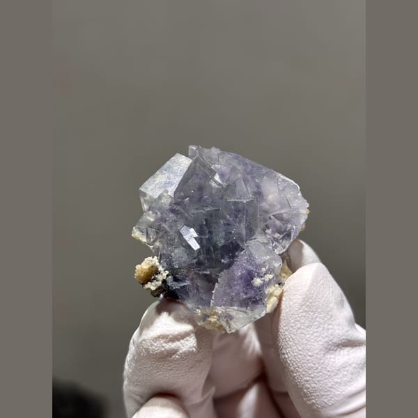 Glassy lilac-blue fluorite cubes from Yaogangxian — alternate view