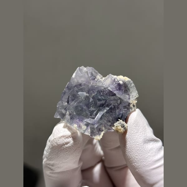 Glassy lilac-blue fluorite cubes from Yaogangxian — alternate view