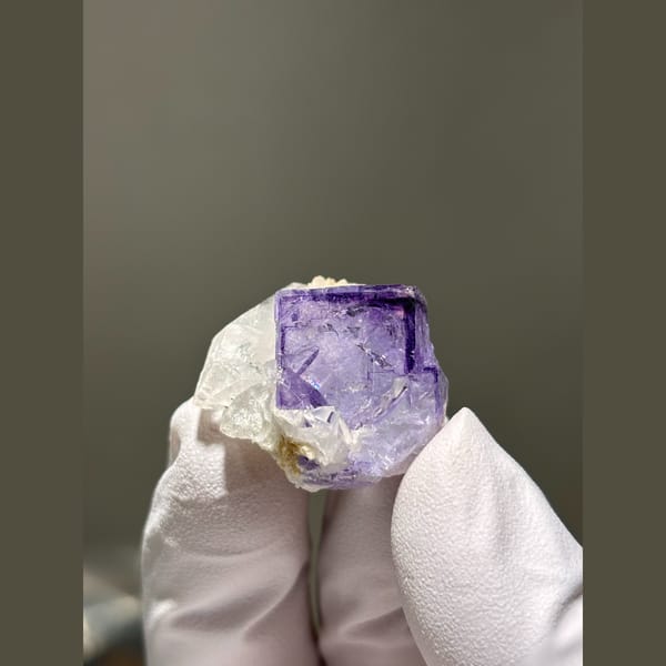 Vivid purple fluorite cube with quartz from Yaogangxian — alternate view