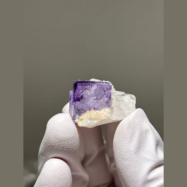 Vivid purple fluorite cube with quartz from Yaogangxian — alternate view