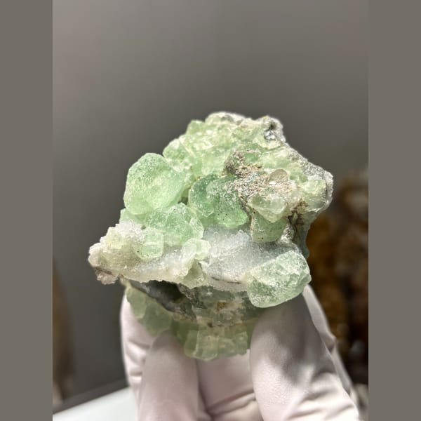 Green fluorite cubes on druzy quartz from Fujian — alternate view