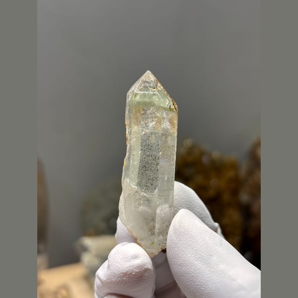 Clear quartz point floater with intact tip from Xuebaoding — alternate view