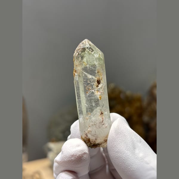 Clear quartz point floater with intact tip from Xuebaoding — alternate view