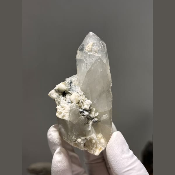 Quartz crystals with white feldspar and mica from Xuebaoding — complete view