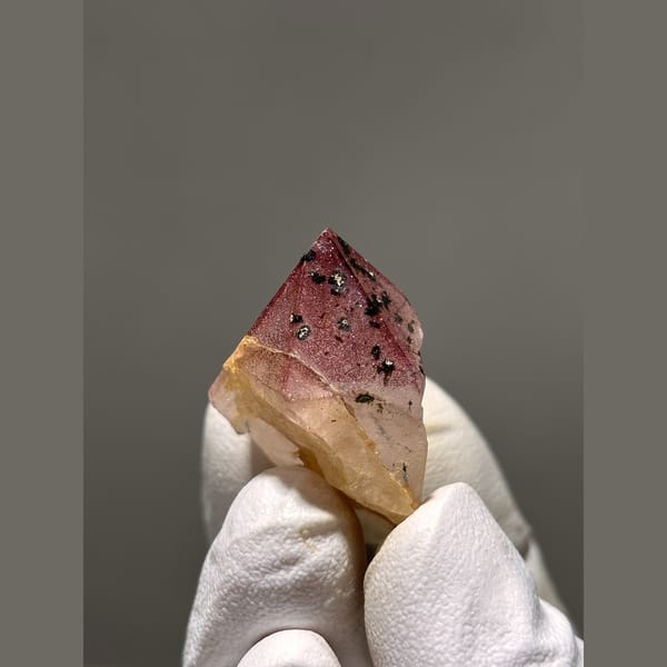 Garden quartz point with pink-red phantom tip from Sichuan — complete view