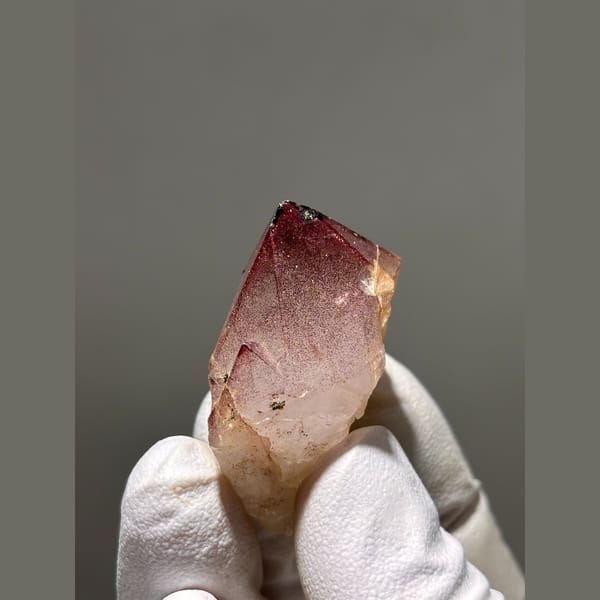 Garden quartz point with pink-red phantom tip from Sichuan — alternate view