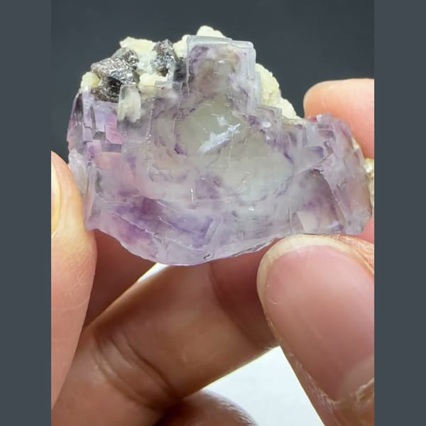 Phantom Fluorite with Cassiterite Yaogangxian 3.2 cm — detail view