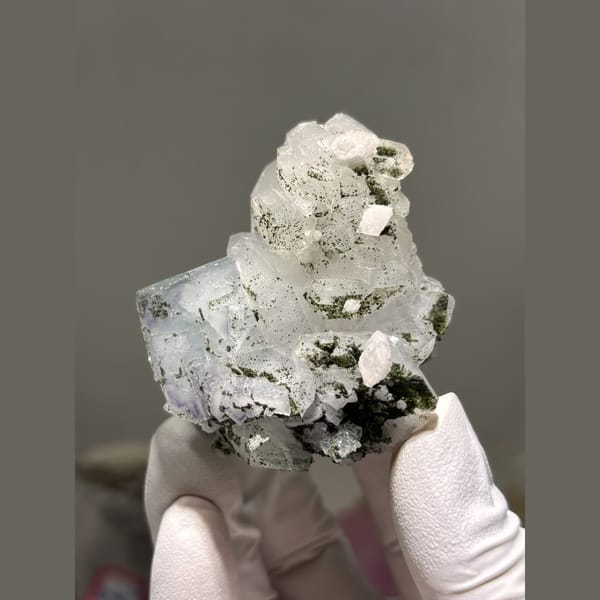 Pale blue fluorite with quartz and calcite from Yaogangxian — detail view