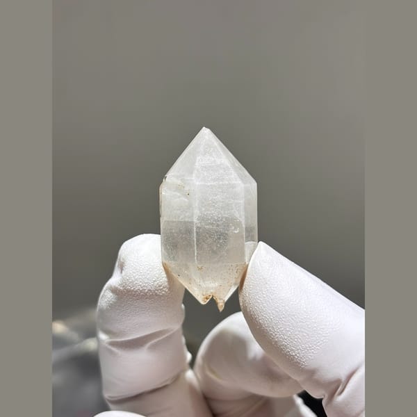 Double terminated quartz crystal with faint inclusions from Yunnan — alternate view