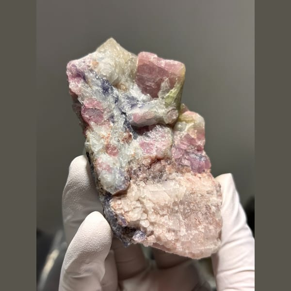 Pink and green tourmaline crystals in pale pink matrix from Brazil — alternate view