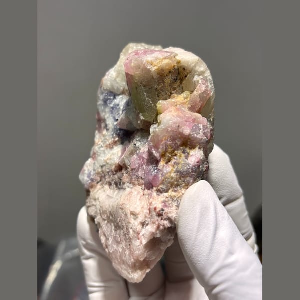 Pink and green tourmaline crystals in pale pink matrix from Brazil — alternate view