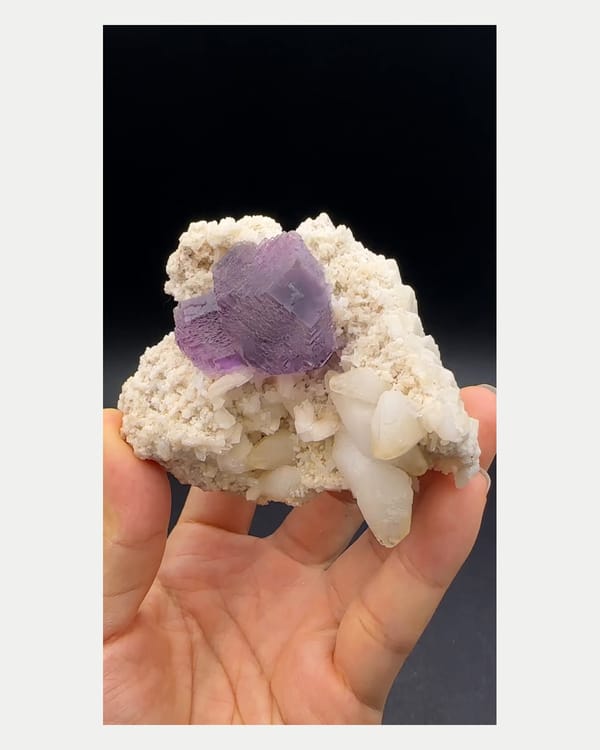 Complete front view of purple Shangbao fluorite with white calcite