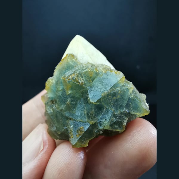 Octahedral blue-green fluorite on candle quartz — alternate view