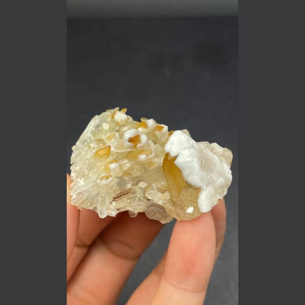 Golden-yellow hexagonal quartz with white dolomite from Jinkouhe — alternate view