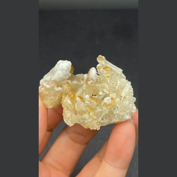 Golden-yellow hexagonal quartz with white dolomite from Jinkouhe — detail view