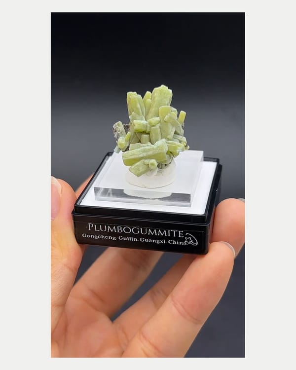 Complete front view of pale green plumbogummite crystal cluster