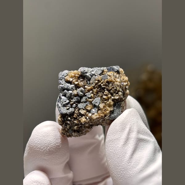Grey metallic cubic galena with calcite — alternate view