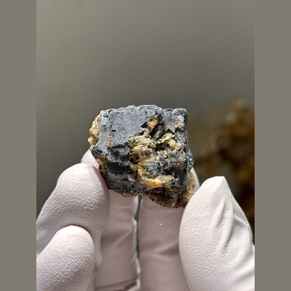 Grey metallic cubic galena with calcite — detail view