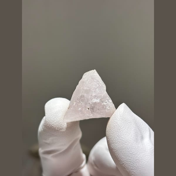 Translucent pale pink apatite crystal from Xuebaoding, Sichuan — complete view