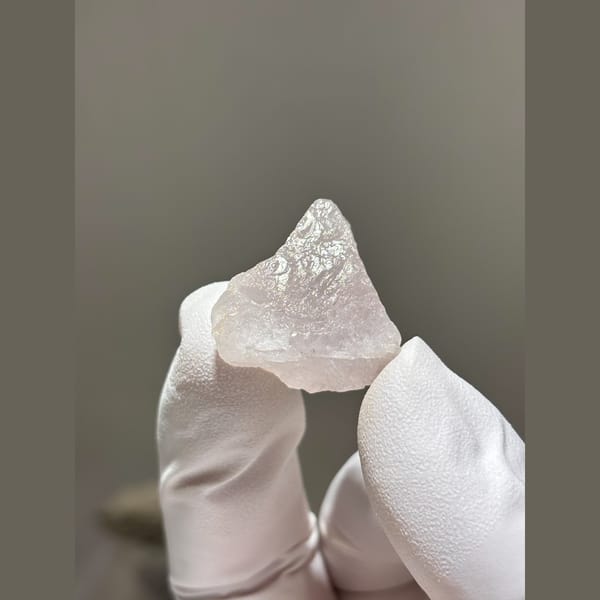 Translucent pale pink apatite crystal from Xuebaoding, Sichuan — alternate view