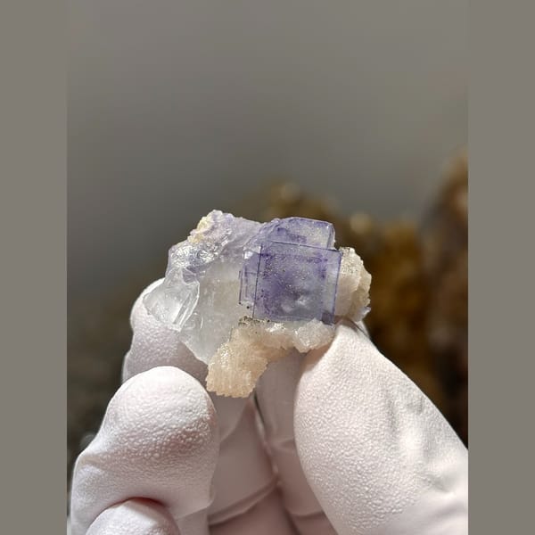Blue-purple fluorite cubes with pale calcite from Yaogangxian, Hunan — alternate view