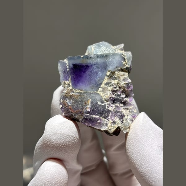Purple fluorite cubes with deep violet cores from Yaogangxian, Hunan — alternate view