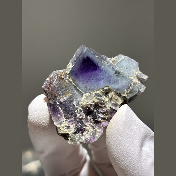Purple fluorite cubes with deep violet cores from Yaogangxian, Hunan — alternate view