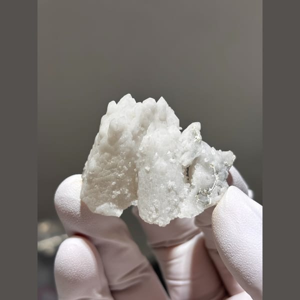 Frosted white quartz floater cluster from Inner Mongolia — complete view