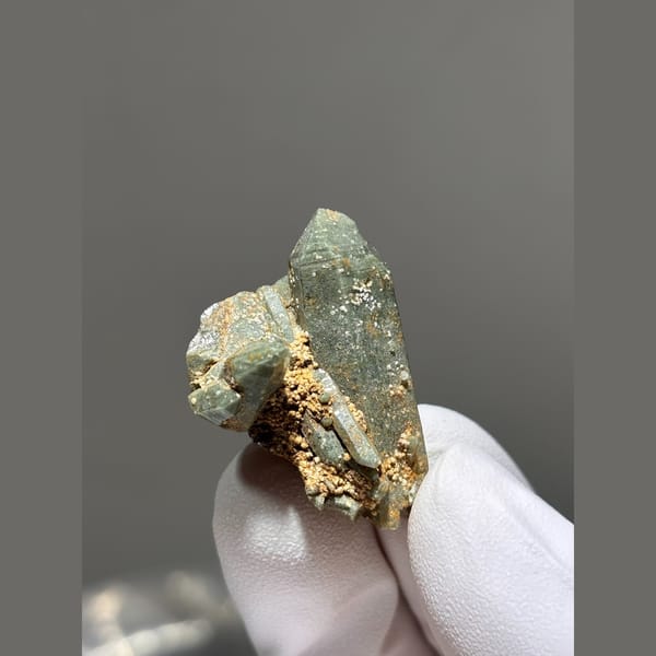 Small green included quartz crystal from Tibet — detail view