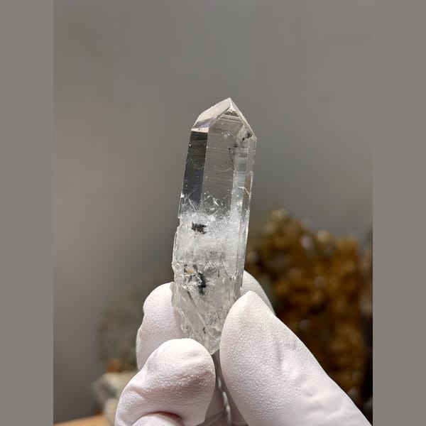 Slender water-clear double-terminated quartz from Jinkouhe, Sichuan — alternate view