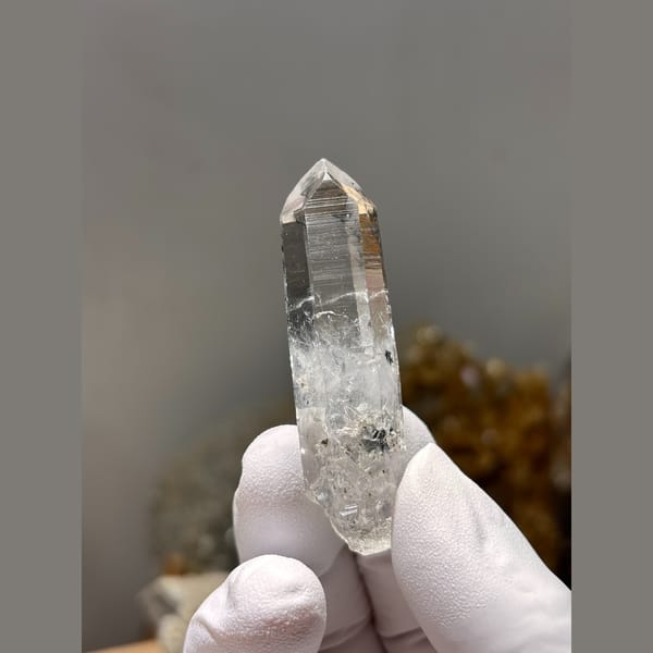 Slender water-clear double-terminated quartz from Jinkouhe, Sichuan — alternate view