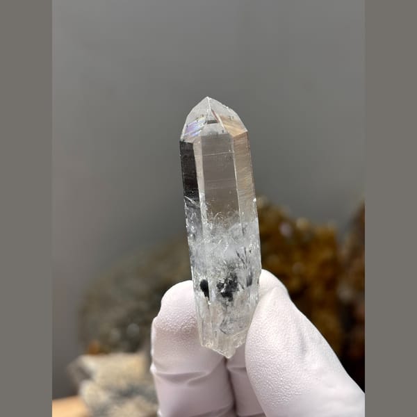 Slender water-clear double-terminated quartz from Jinkouhe, Sichuan — detail view
